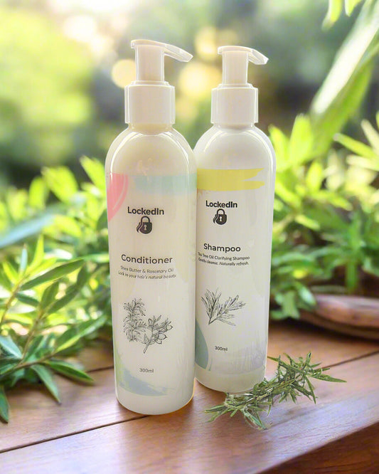 Two bottles of shampoo and conditioner with natural elements on a wooden surface.