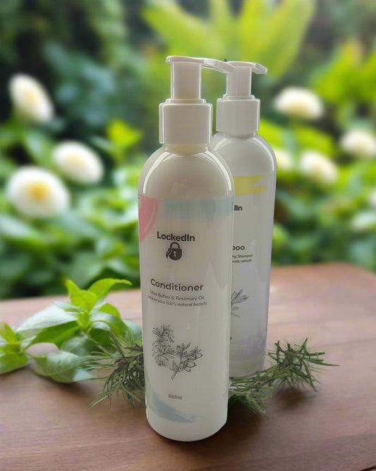 Two bottles of 'Lockedin' conditioner and shampoo on a wooden surface with a natural background.